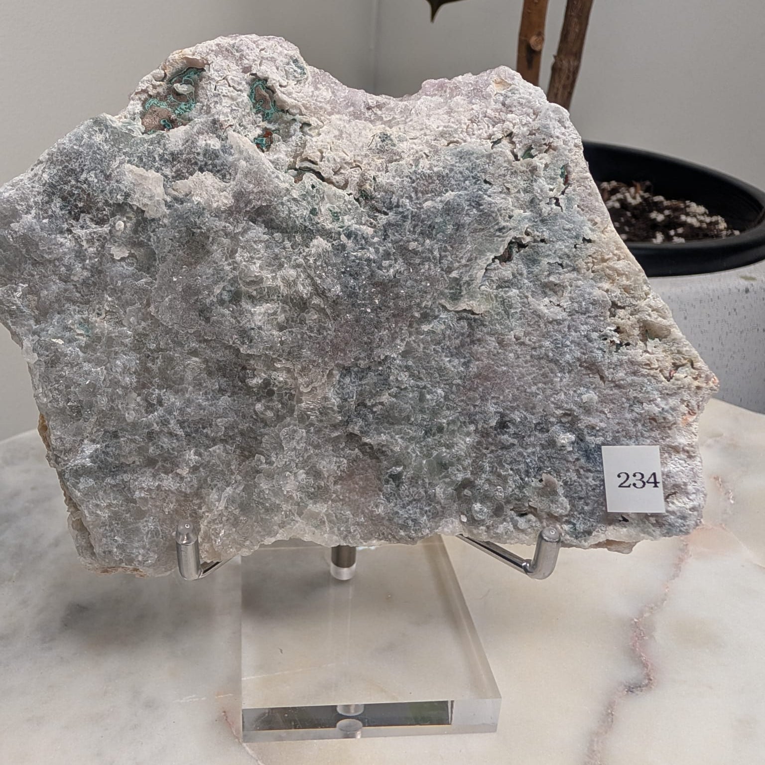 Lilac Zeolite on stand
